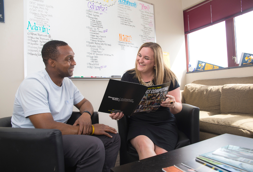 jennifer helping a student