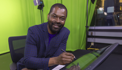 Fisayo Omojokun-seated in production studio