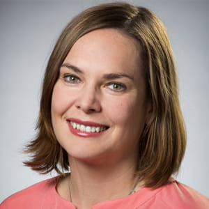 Woman with brown hair smiling 