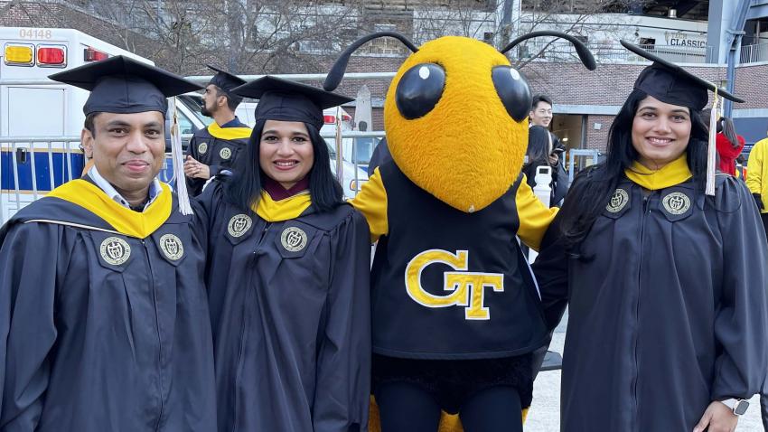 Family of graduates celebrate completing the program together. 