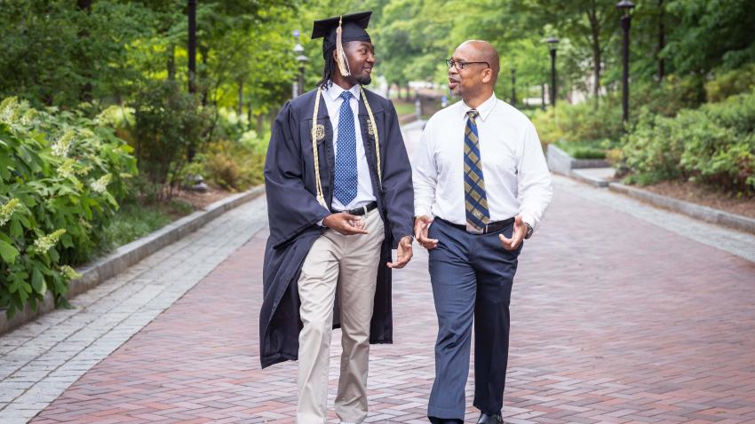 Father and son, Sababu and Tai'Re Barashango, share a bond through CS at Georgia Tech; Sababu as a Center for Education Fellow and Tai'Re as a graduating CS major. Photos by Kevin Beasley/ College of Computing.