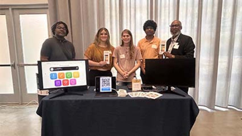 Gregory White (right) served as the student team's client in the CS Junior Design Capstone program. Photos by Gregory White.