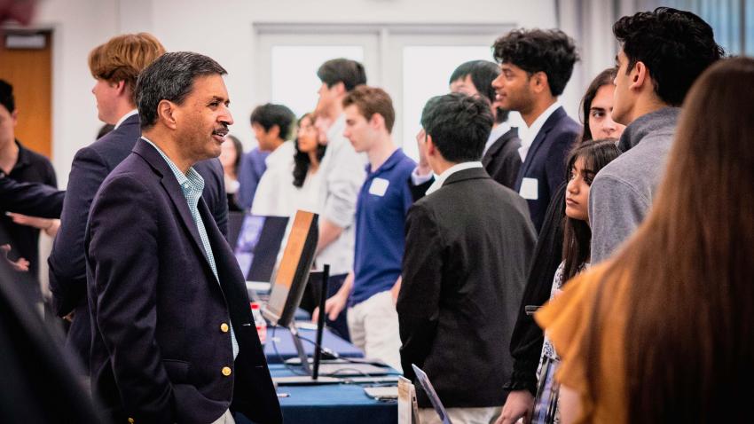 College of Computing Dean Vivek Sarkar speaks with student teams and watches demos. Photos by Kevin Beasley/ College of Computing.