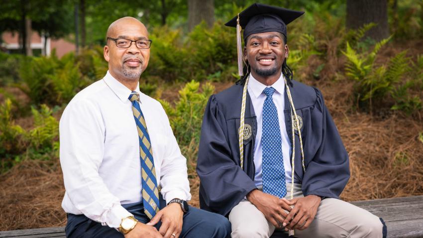 Sababu Barashango and Tai'Re Barashango celebrate Tai'Re’s graduation from Georgia Tech, marking the next step in his journey as a software engineer.