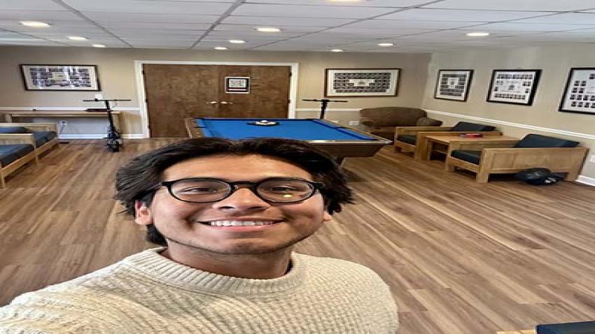 Yamil Quispe stands in one of the house’s recreation areas, which offers balance of work and play for residents. Photos by Yamil Quispe.