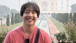 Graduating CS Major Andrew Wang outside the Taj Mahal
