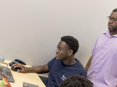 GT Computing's Terry Foster (right) helped to develop the College's expanded offering for the 2026 Georgia Tech Summer Institute.