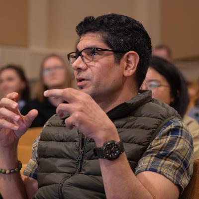 A member of the audience asks a question during Frontiers in Science.