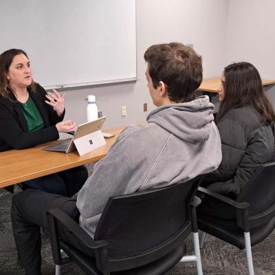 Whitlow mentors students Gabriel Wetherby and Shubhangi Asthana on their startup for the entrepreneurial capstone.