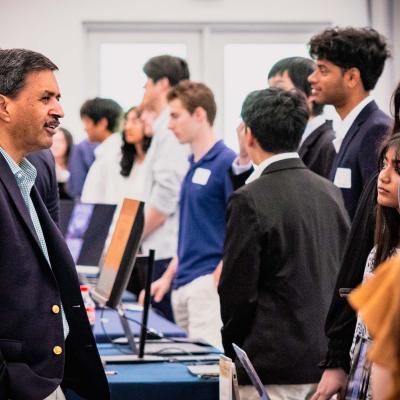 College of Computing Dean Vivek Sarkar speaks with student teams and watches demos. Photos by Kevin Beasley/ College of Computing.